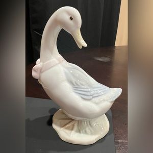 Vintage porcelain goose figurine with pastel colors by George Good